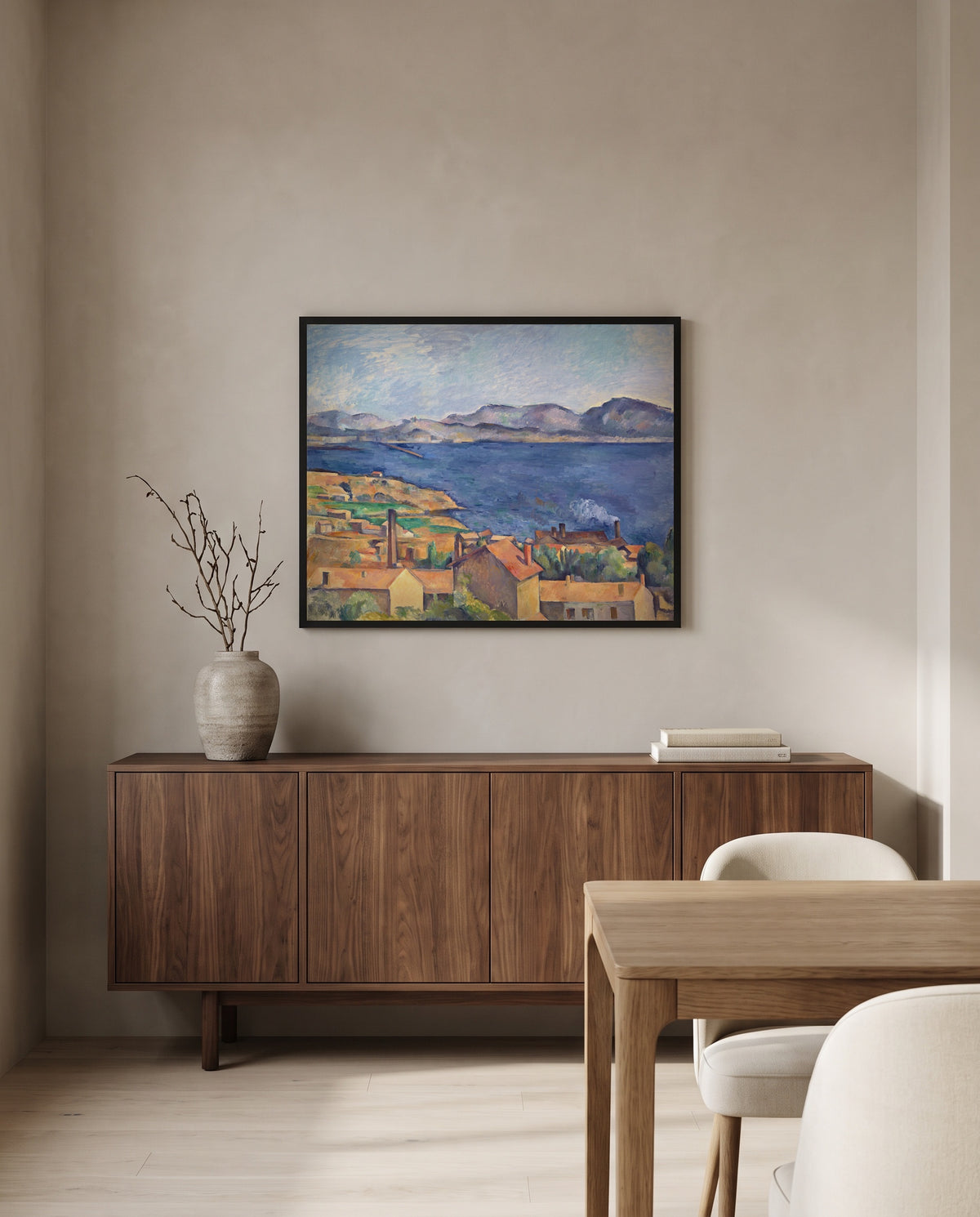The Bay of Marseille by Paul Cézanne in a black frame above a walnut sideboard in a dining room