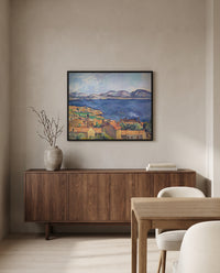 The Bay of Marseille by Paul Cézanne in a black frame above a walnut sideboard in a dining room