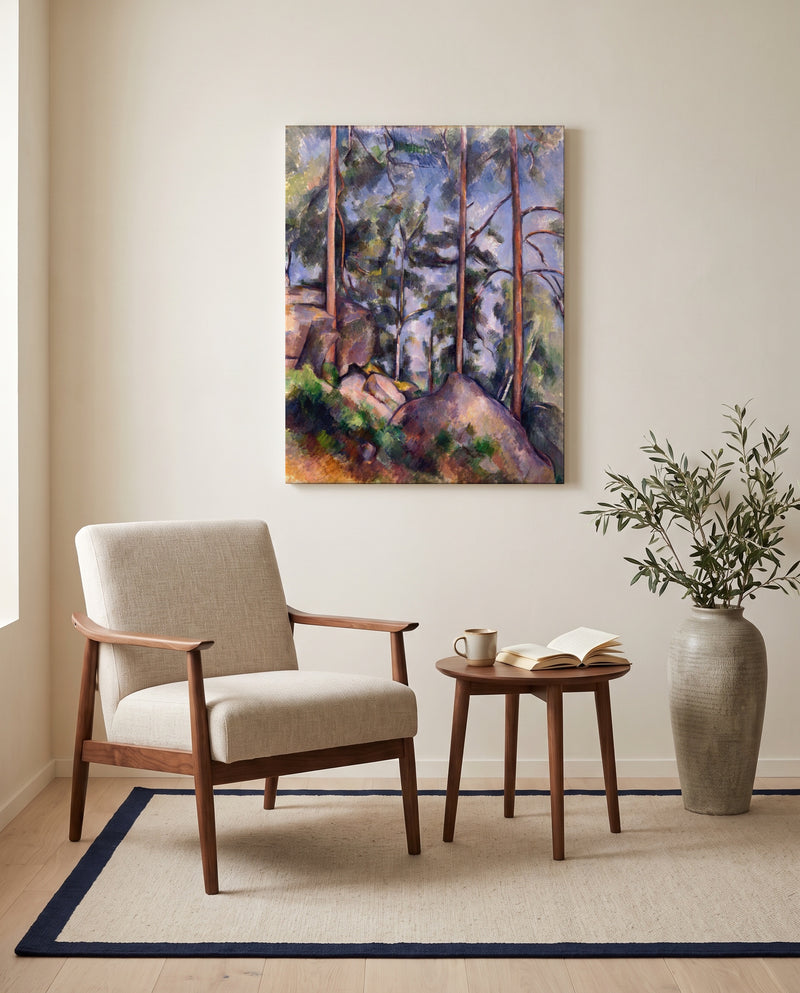 Pines and Rocks by Paul Cézanne as a stretched canvas above a linen lounge chair in a reading corner