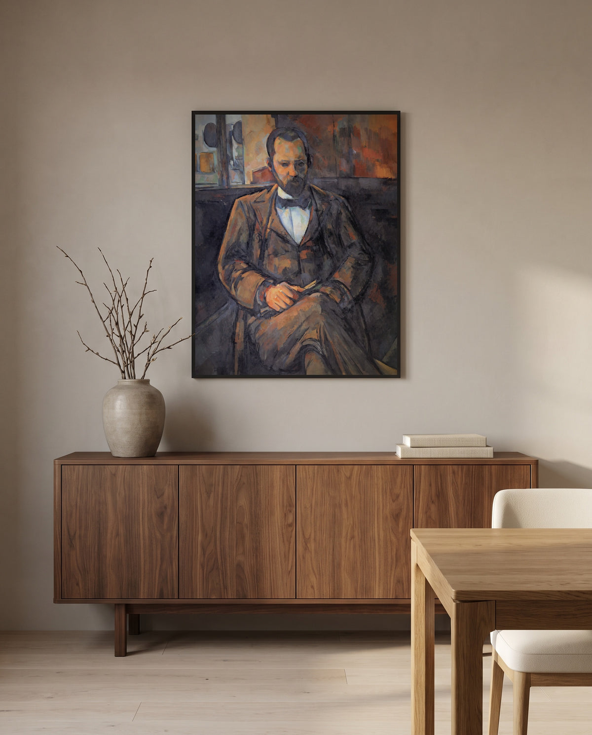 Ambroise Vollard by Paul Cézanne in a black frame above a walnut sideboard in a dining room