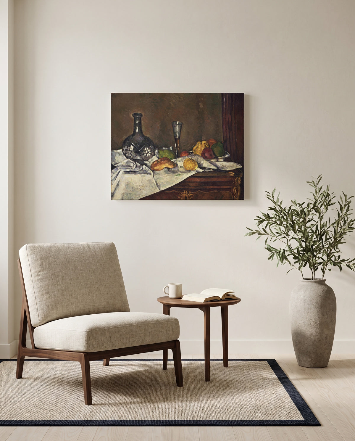 Still Life with a Dessert by Paul Cézanne as a stretched canvas above a linen lounge chair in a reading corner