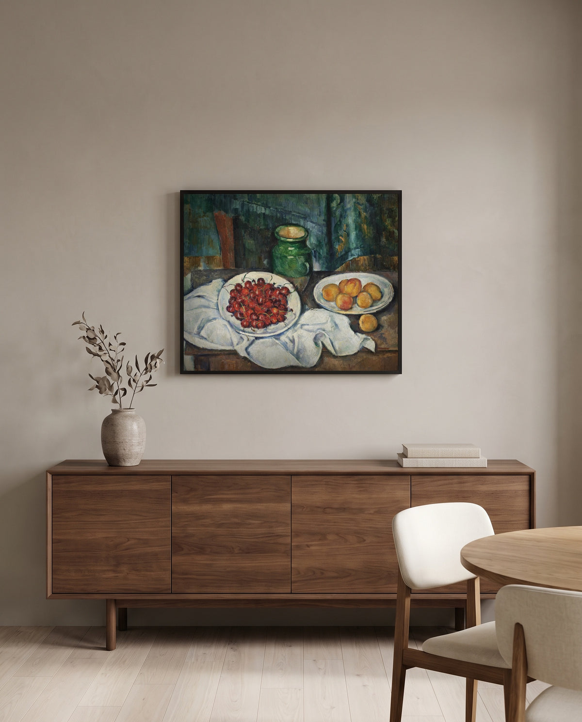 Cherries and Peaches by Paul Cézanne in a black frame above a walnut sideboard in a dining room
