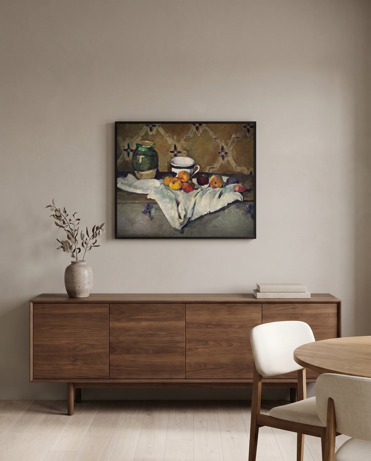 Jar, Cup and Apples by Paul Cézanne in a black frame above a walnut sideboard in a dining room