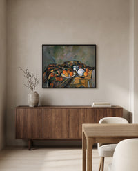 Still Life with Teapot by Paul Cézanne in a black frame above a walnut sideboard in a dining room
