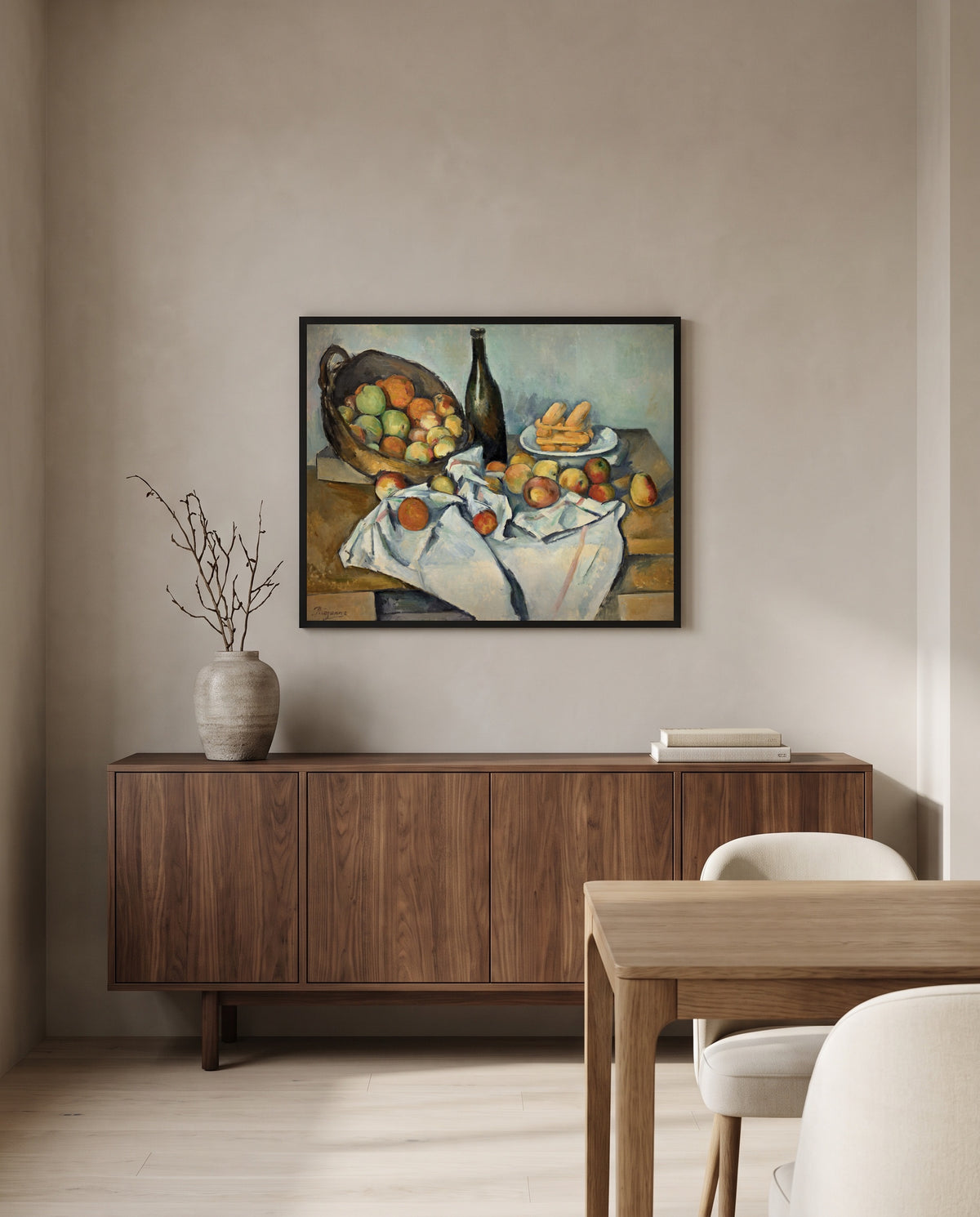 The Basket of Apples by Paul Cézanne in a black frame above a walnut sideboard in a dining room