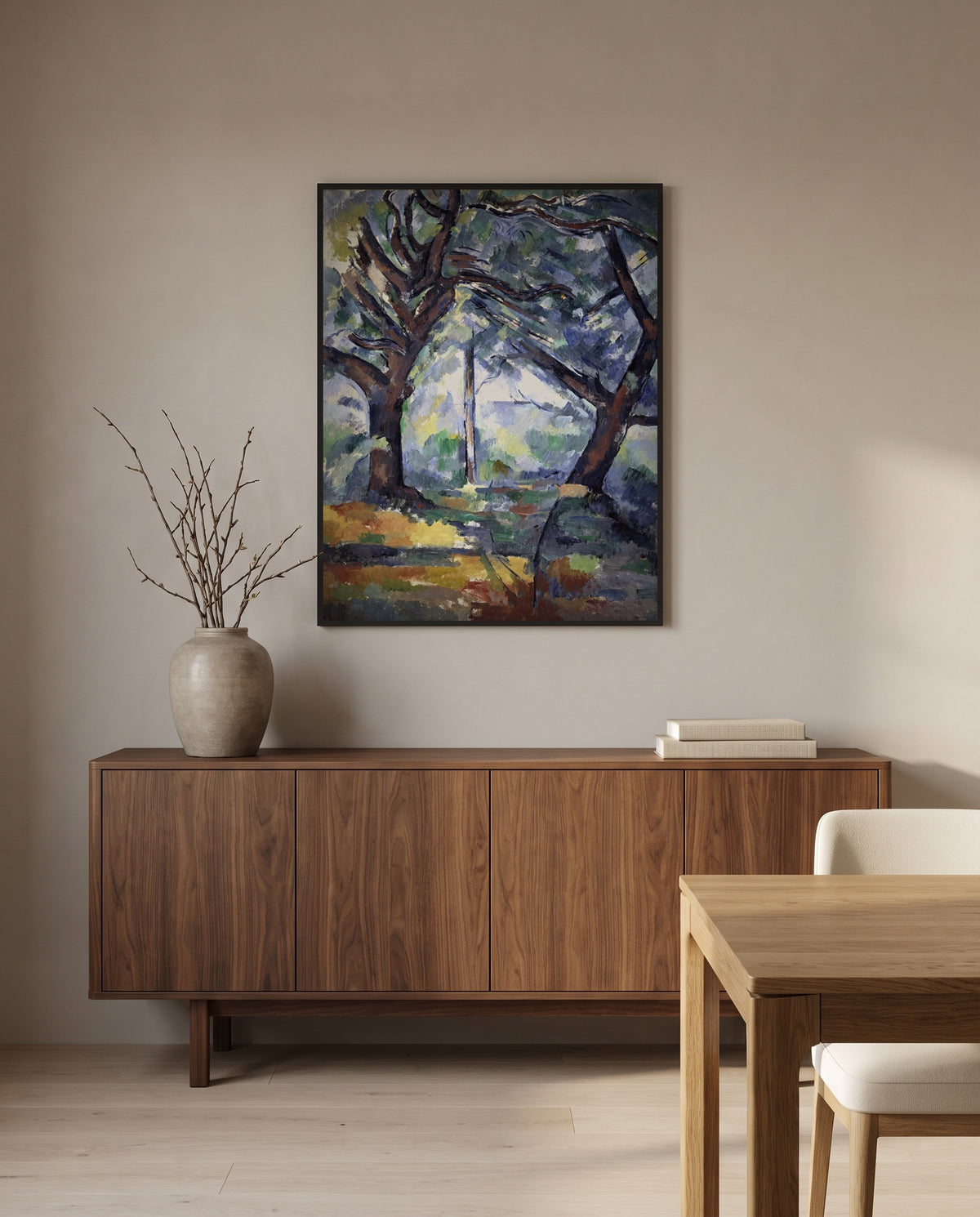 The Big Trees by Paul Cézanne in a black frame above a walnut sideboard in a dining room