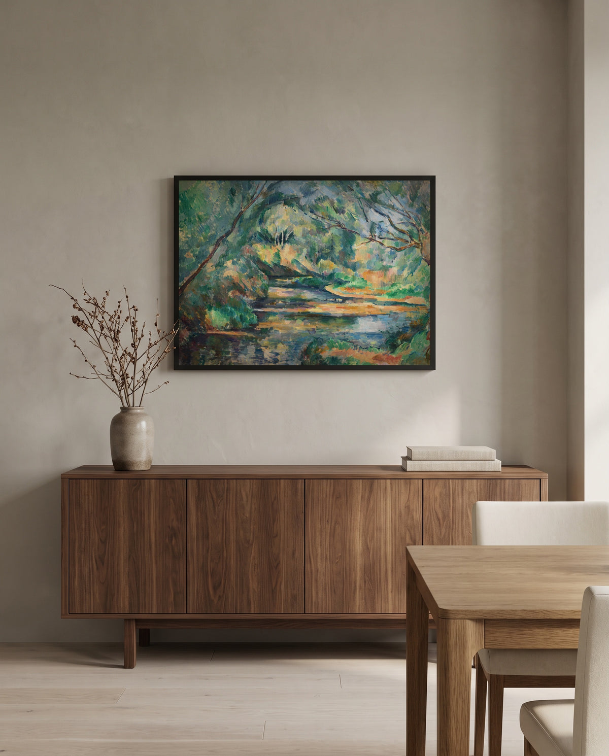 The Brook by Paul Cézanne in a black frame above a walnut sideboard in a dining room