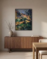 Road at Montgeroult by Paul Cézanne in a black frame above a walnut sideboard in a dining room