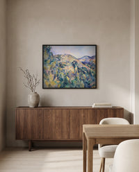 Domaine Saint-Joseph by Paul Cézanne in a black frame above a walnut sideboard in a dining room
