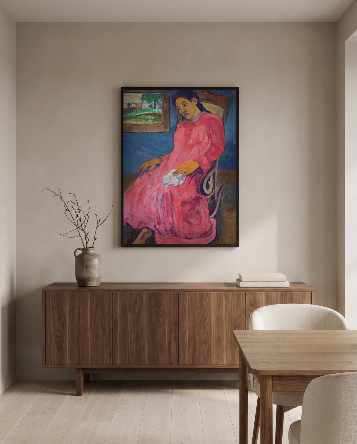 Faaturuma by Paul Gauguin in a black frame above a walnut sideboard in a dining room