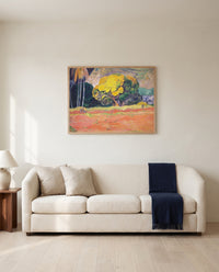 Fatata te Moua by Paul Gauguin framed in natural oak above a cream sofa in a warm living room