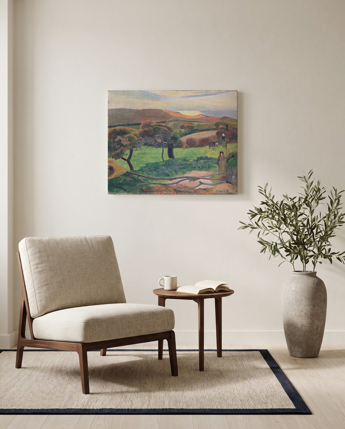 Fields by the Sea by Paul Gauguin as a stretched canvas above a linen lounge chair in a reading corner