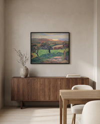 Fields by the Sea by Paul Gauguin in a black frame above a walnut sideboard in a dining room