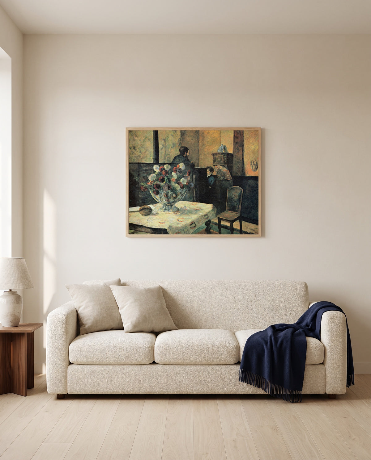Interior, rue Carcel by Paul Gauguin framed in natural oak above a cream sofa in a warm living room
