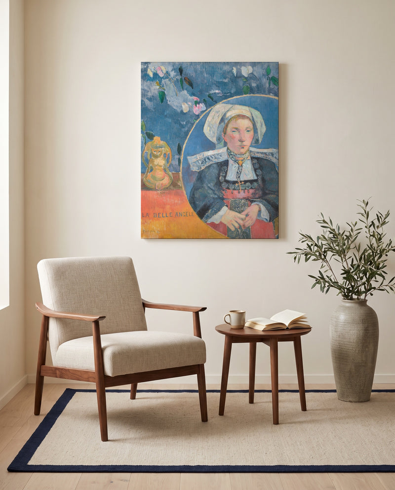 La Belle Angèle by Paul Gauguin as a stretched canvas above a linen lounge chair in a reading corner