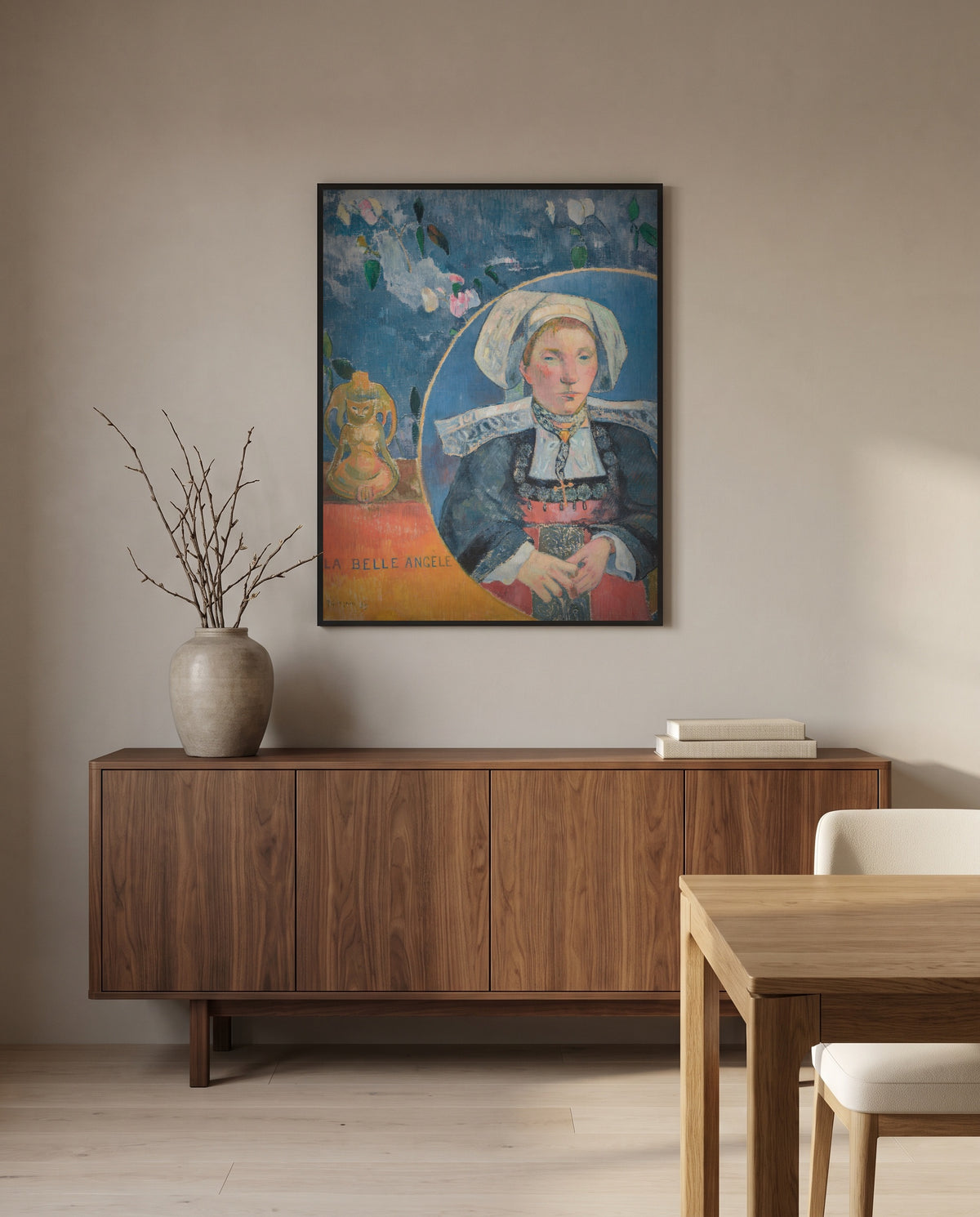 La Belle Angèle by Paul Gauguin in a black frame above a walnut sideboard in a dining room