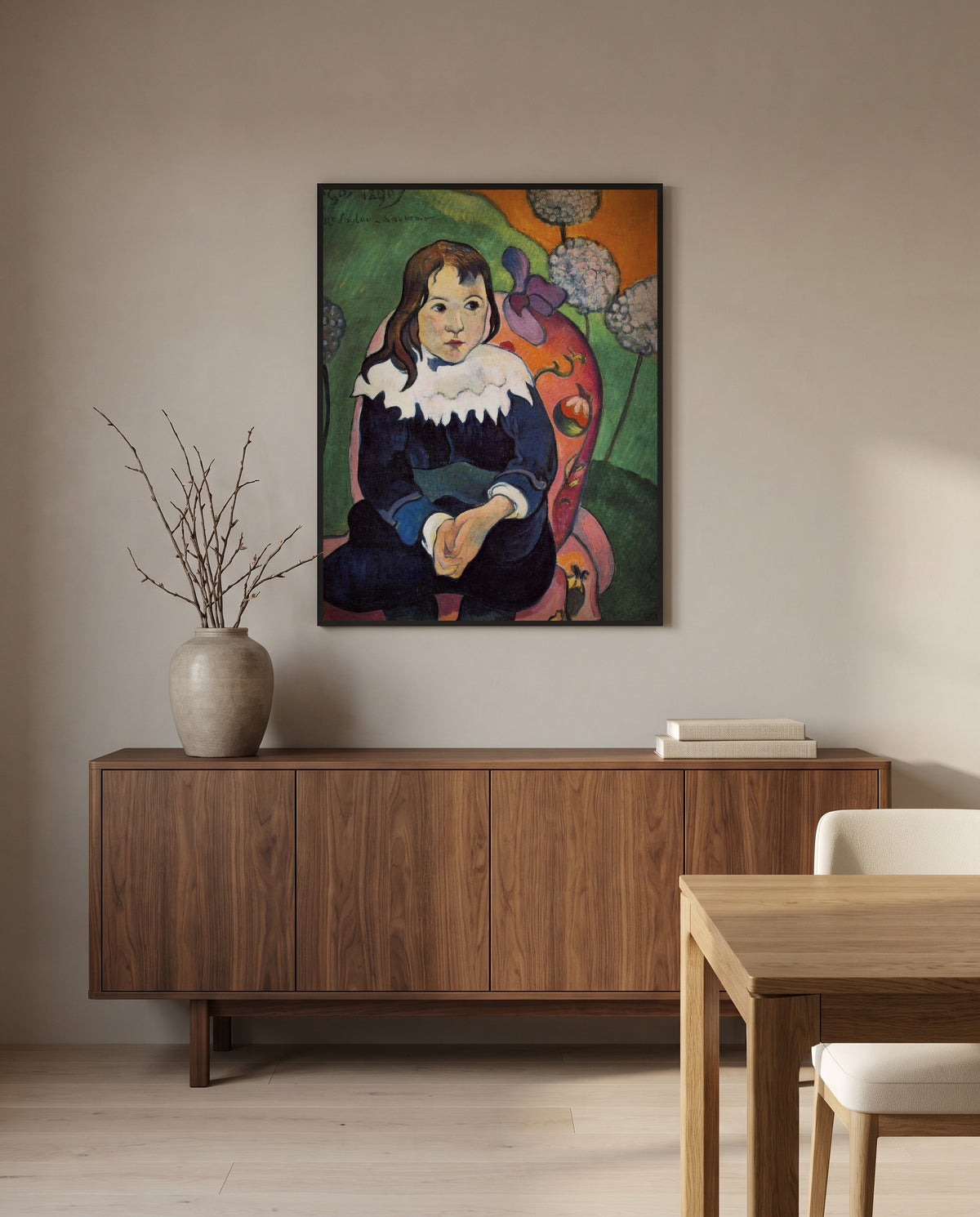 Mr. Loulou by Paul Gauguin in a black frame above a walnut sideboard in a dining room