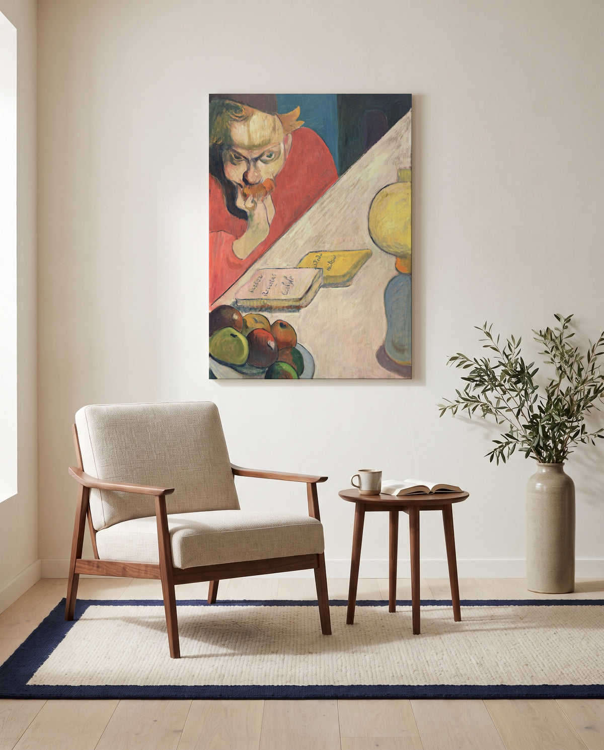 Portrait of Meijer de Haan by Paul Gauguin as a stretched canvas above a linen lounge chair in a reading corner