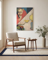Portrait of Meijer de Haan by Paul Gauguin as a stretched canvas above a linen lounge chair in a reading corner