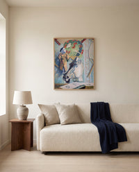 Still Life with Horse’s Head by Paul Gauguin framed in natural oak above a cream sofa in a warm living room