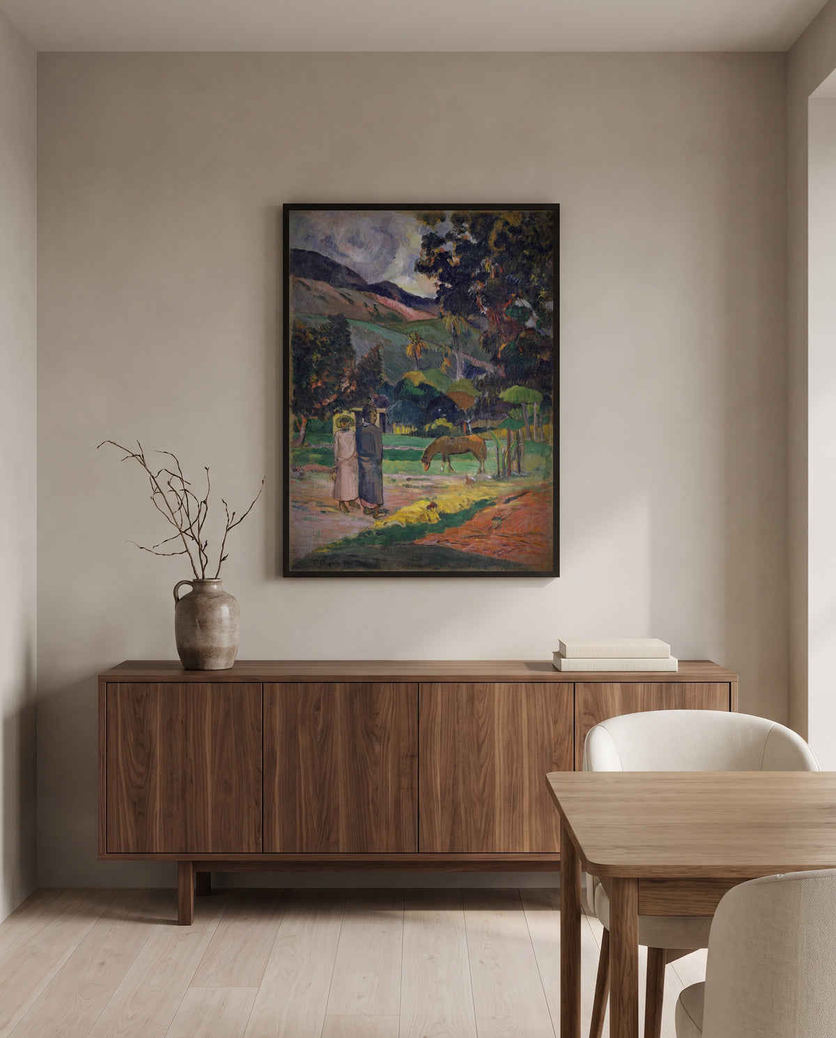 Tahitian Landscape, 1892 by Paul Gauguin in a black frame above a walnut sideboard in a dining room