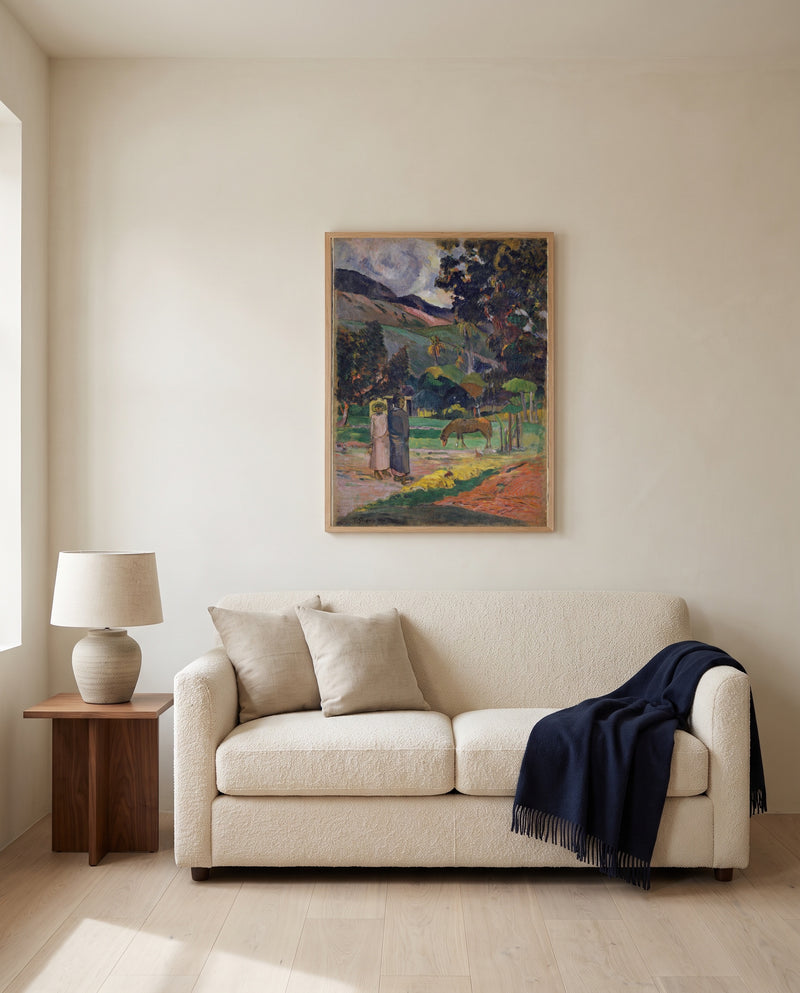 Tahitian Landscape, 1892 by Paul Gauguin framed in natural oak above a cream sofa in a warm living room