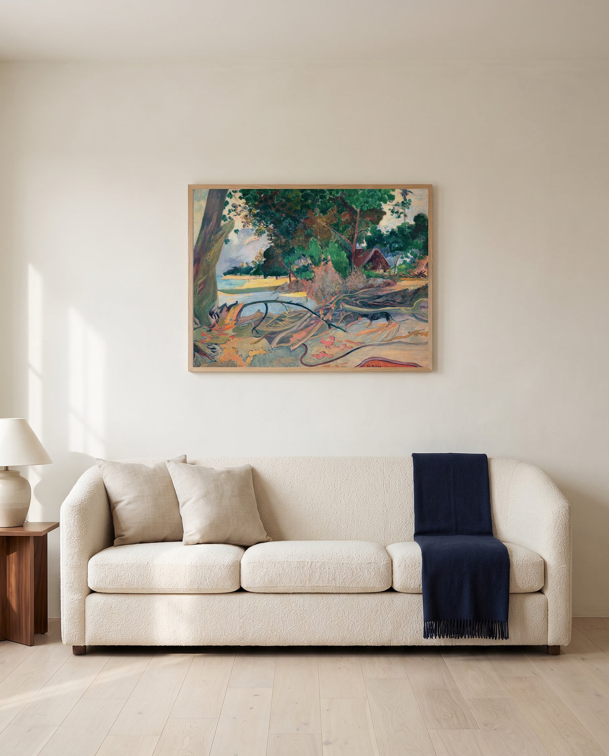 The Hibiscus Tree by Paul Gauguin framed in natural oak above a cream sofa in a warm living room