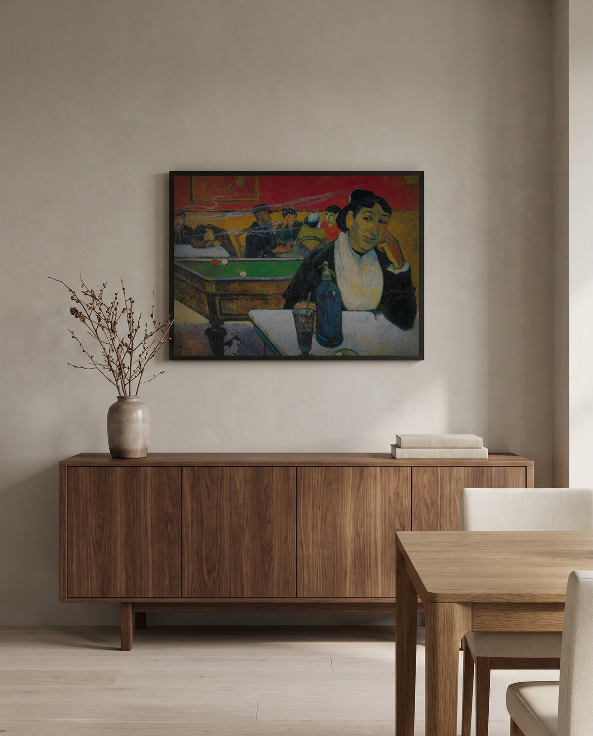 The Night Café at Arles by Paul Gauguin in a black frame above a walnut sideboard in a dining room