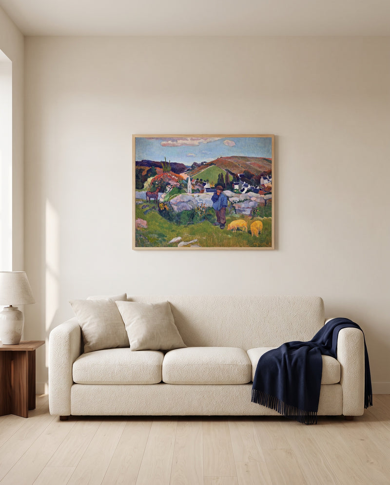 The Swineherd by Paul Gauguin framed in natural oak above a cream sofa in a warm living room