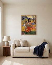 When Will You Marry? by Paul Gauguin framed in natural oak above a cream sofa in a warm living room