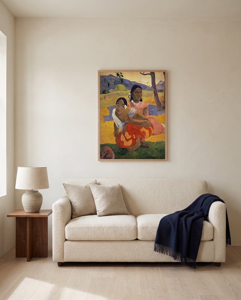 When Will You Marry? by Paul Gauguin framed in natural oak above a cream sofa in a warm living room