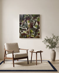 Swamp Legend by Paul Klee as a stretched canvas above a linen lounge chair in a reading corner