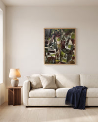 Swamp Legend by Paul Klee framed in natural oak above a cream sofa in a warm living room