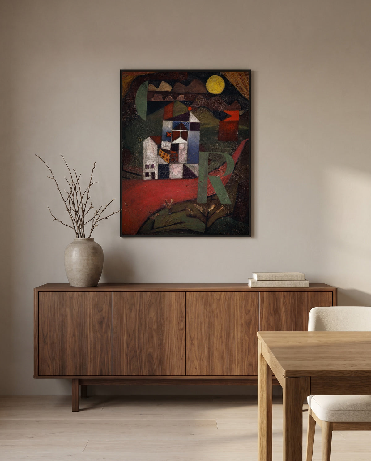 Villa R by Paul Klee in a black frame above a walnut sideboard in a dining room