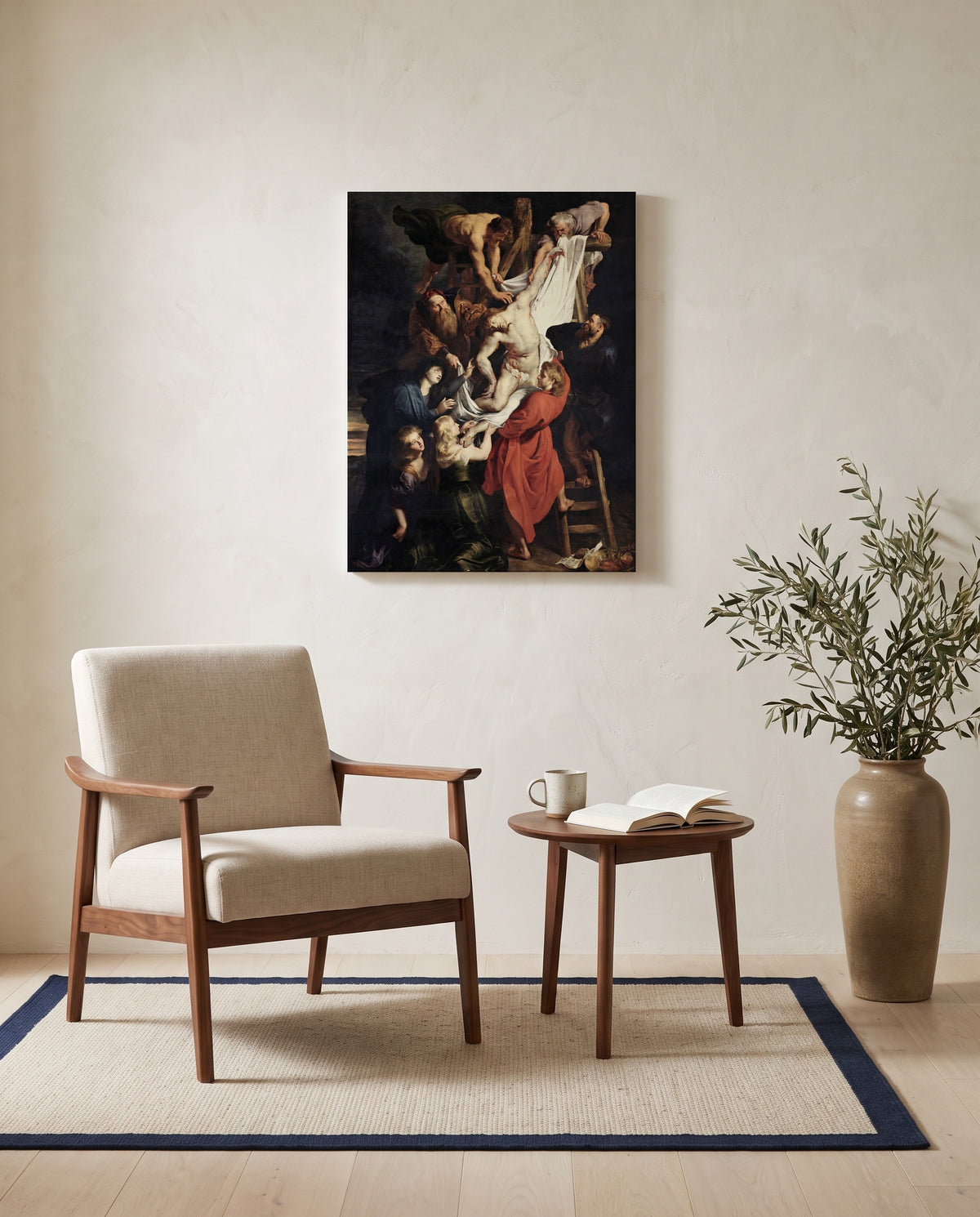The Descent from the Cross by Peter Paul Rubens as a stretched canvas above a linen lounge chair in a reading corner
