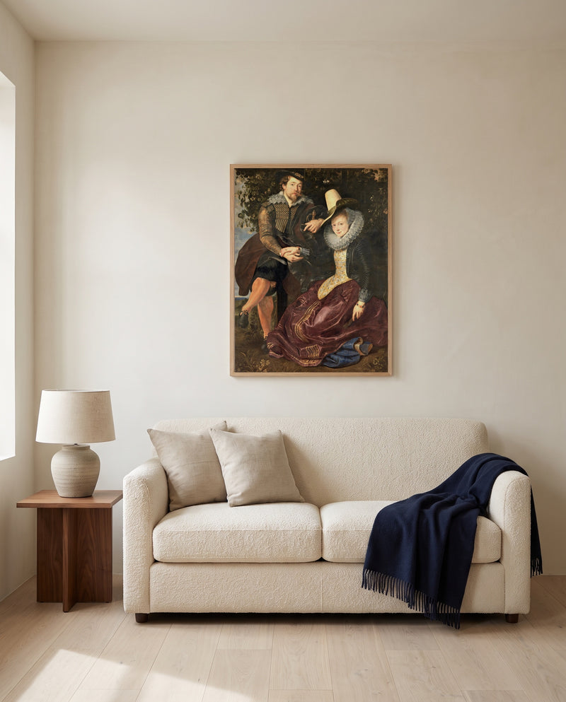 The Honeysuckle Bower by Peter Paul Rubens framed in natural oak above a cream sofa in a warm living room