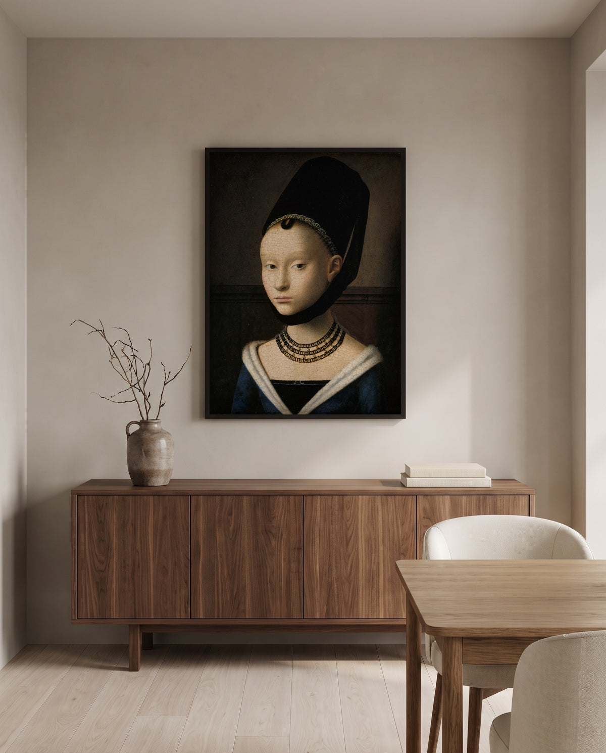 Portrait of a Young Girl by Petrus Christus in a black frame above a walnut sideboard in a dining room