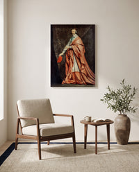 Cardinal de Richelieu by Philippe de Champaigne as a stretched canvas above a linen lounge chair in a reading corner