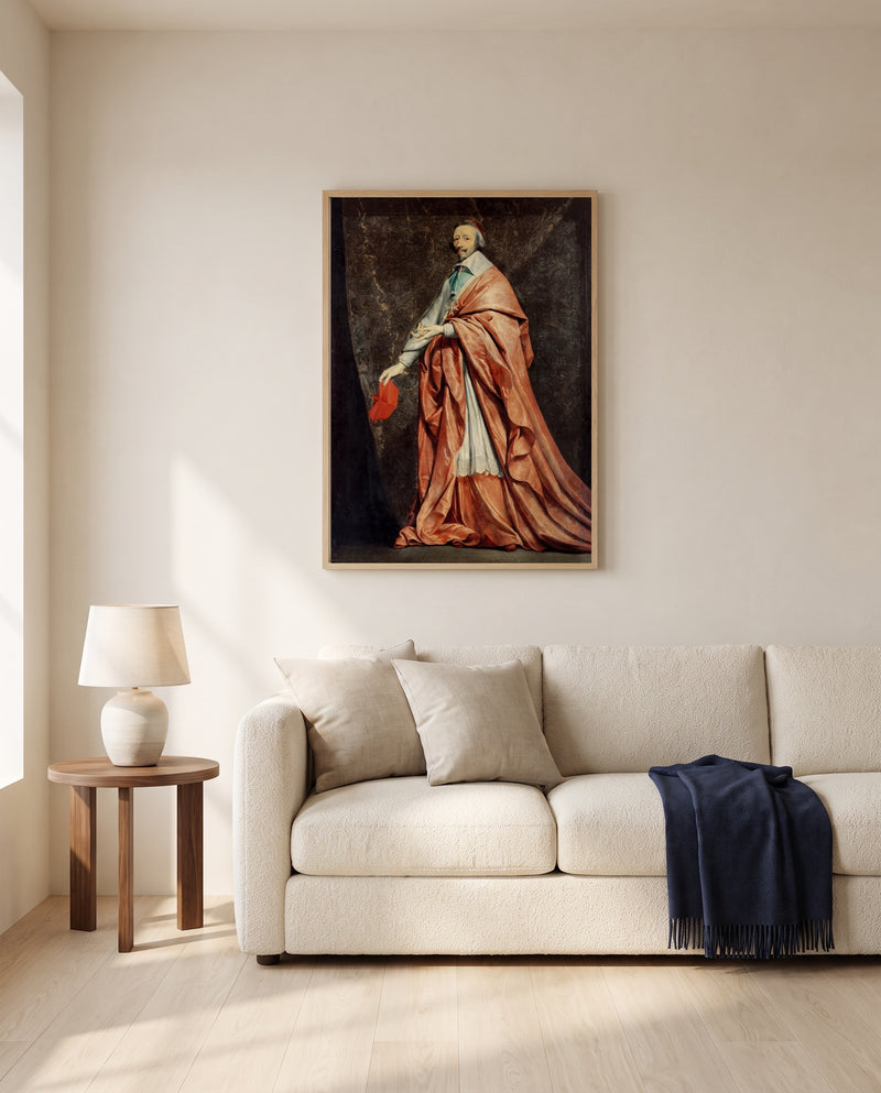 Cardinal de Richelieu by Philippe de Champaigne framed in natural oak above a cream sofa in a warm living room