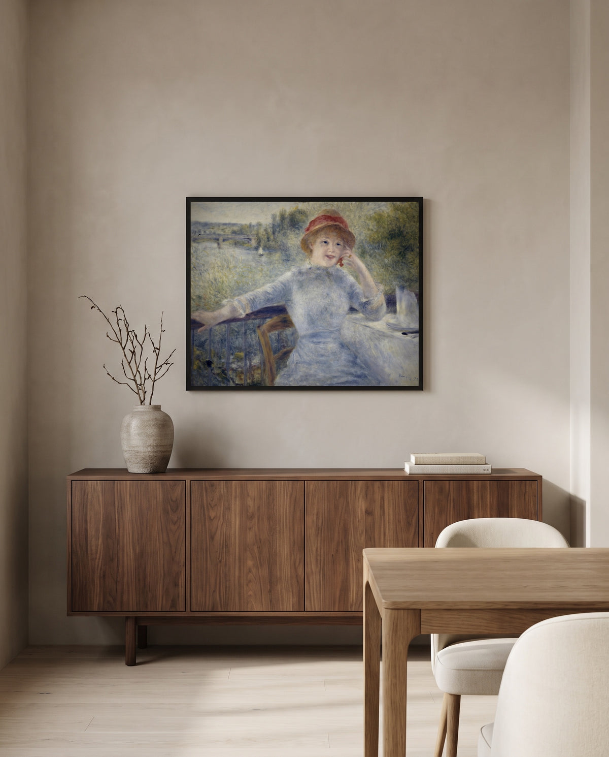 Alphonsine Fournaise by Pierre-Auguste Renoir in a black frame above a walnut sideboard in a dining room