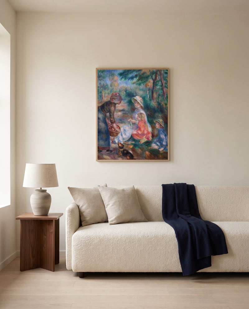 The Apple Seller by Pierre-Auguste Renoir framed in natural oak above a cream sofa in a warm living room