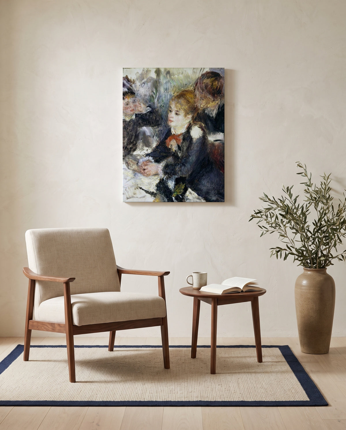 At the Milliner’s by Pierre-Auguste Renoir as a stretched canvas above a linen lounge chair in a reading corner