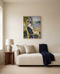 By the Seashore by Pierre-Auguste Renoir framed in natural oak above a cream sofa in a warm living room