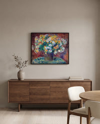 Chrysanthemums by Pierre-Auguste Renoir in a black frame above a walnut sideboard in a dining room