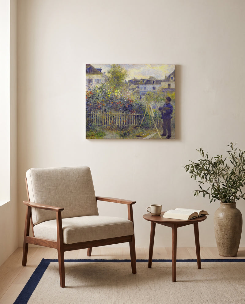 Monet in His Garden by Pierre-Auguste Renoir as a stretched canvas above a linen lounge chair in a reading corner