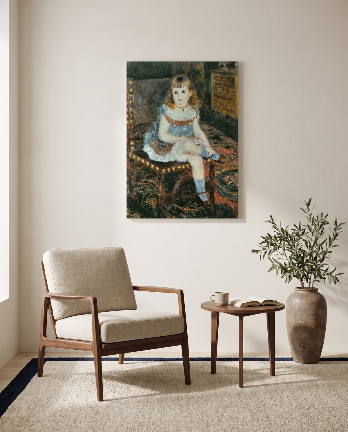 Georgette Charpentier by Pierre-Auguste Renoir as a stretched canvas above a linen lounge chair in a reading corner