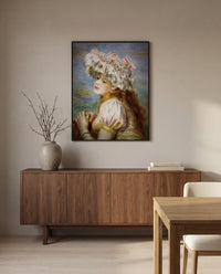 Girl in a Lace Hat by Pierre-Auguste Renoir in a black frame above a walnut sideboard in a dining room