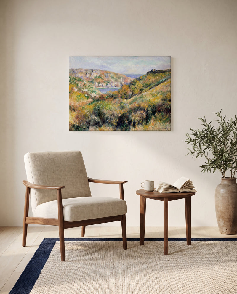 Moulin Huet Bay, Guernsey by Pierre-Auguste Renoir as a stretched canvas above a linen lounge chair in a reading corner