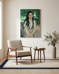 In Summer by Pierre-Auguste Renoir as a stretched canvas above a linen lounge chair in a reading corner