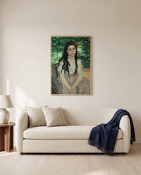 In Summer by Pierre-Auguste Renoir framed in natural oak above a cream sofa in a warm living room